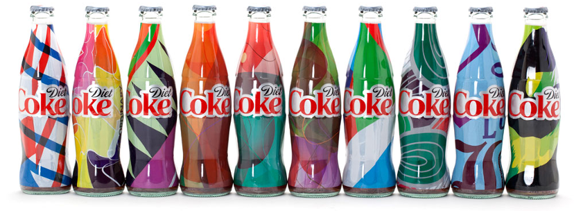 a colorful row of Coca Cola bottles